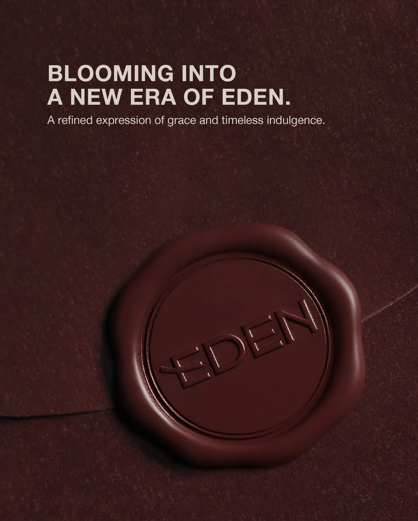 The launch post, a burgundy wax seal pressed with the Eden wordmark.