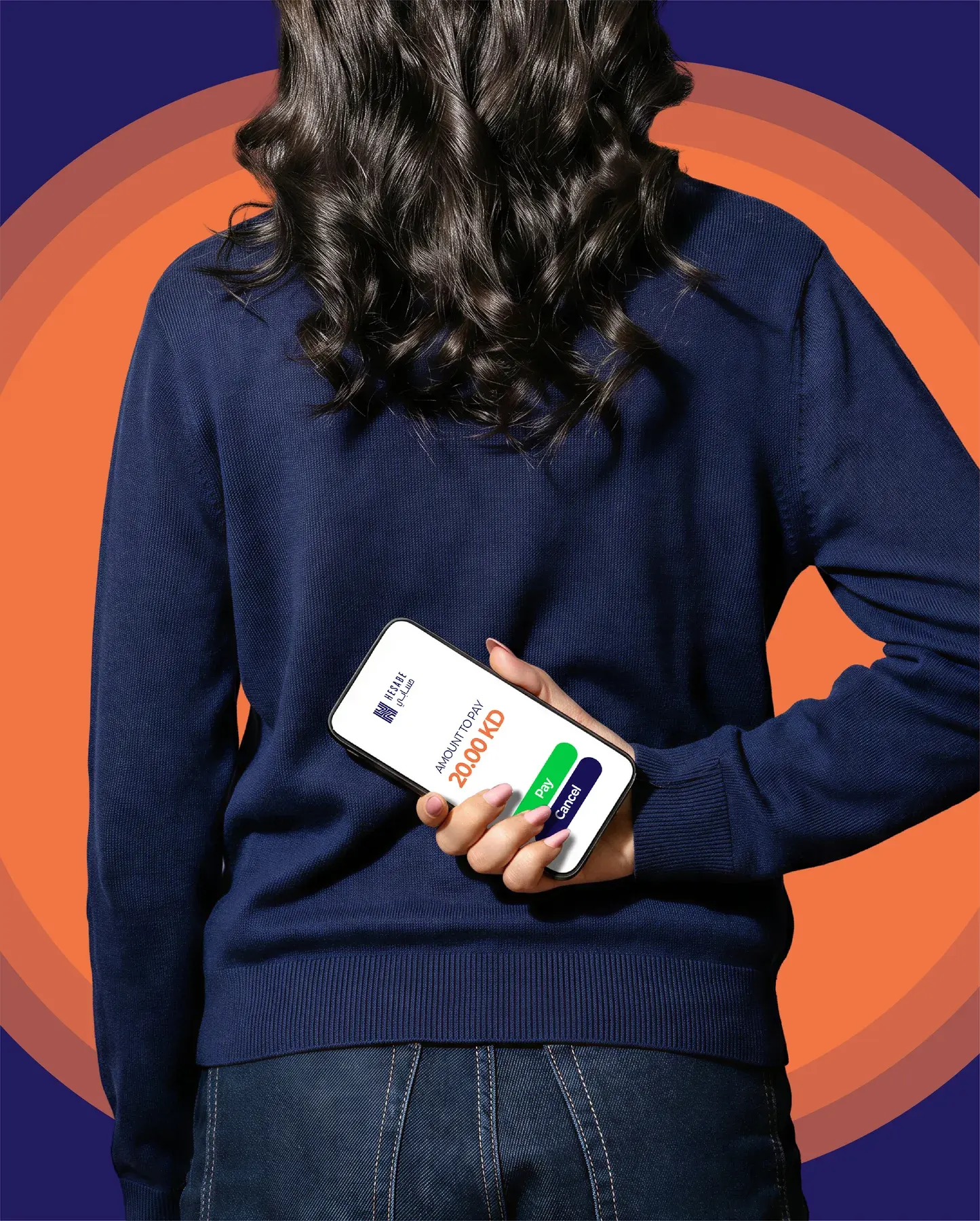 A phone held behind the back against an orange arc.
