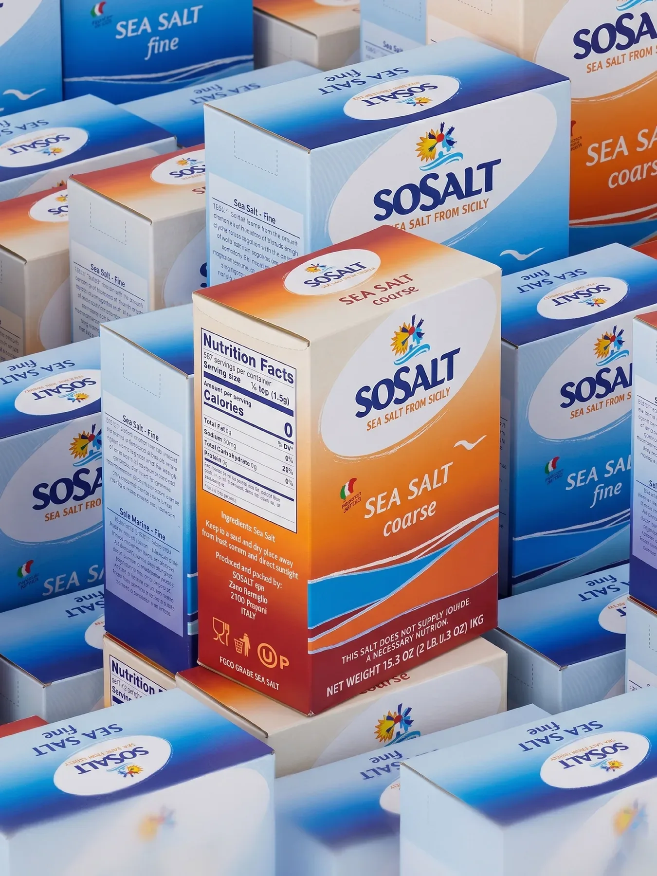 Boxes of coarse and fine sea salt arranged as a blue grid.