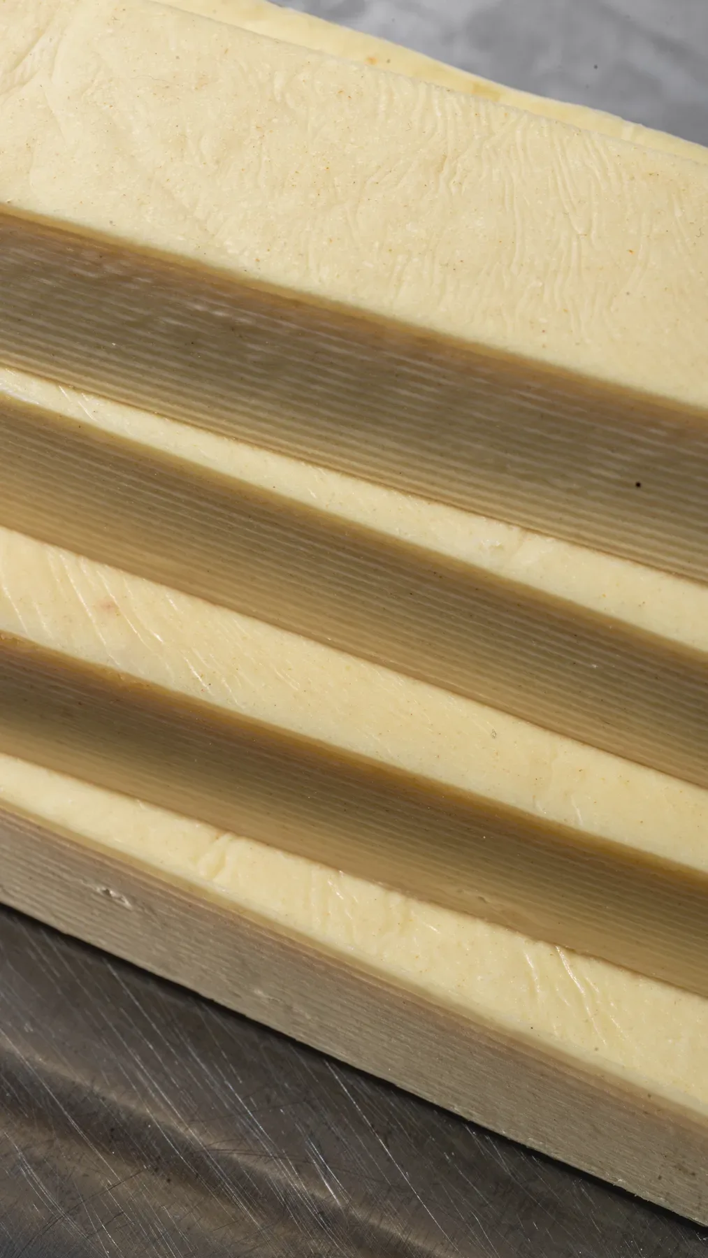 Sheets of lamination butter in close up, the cover frame for the croissant reel.