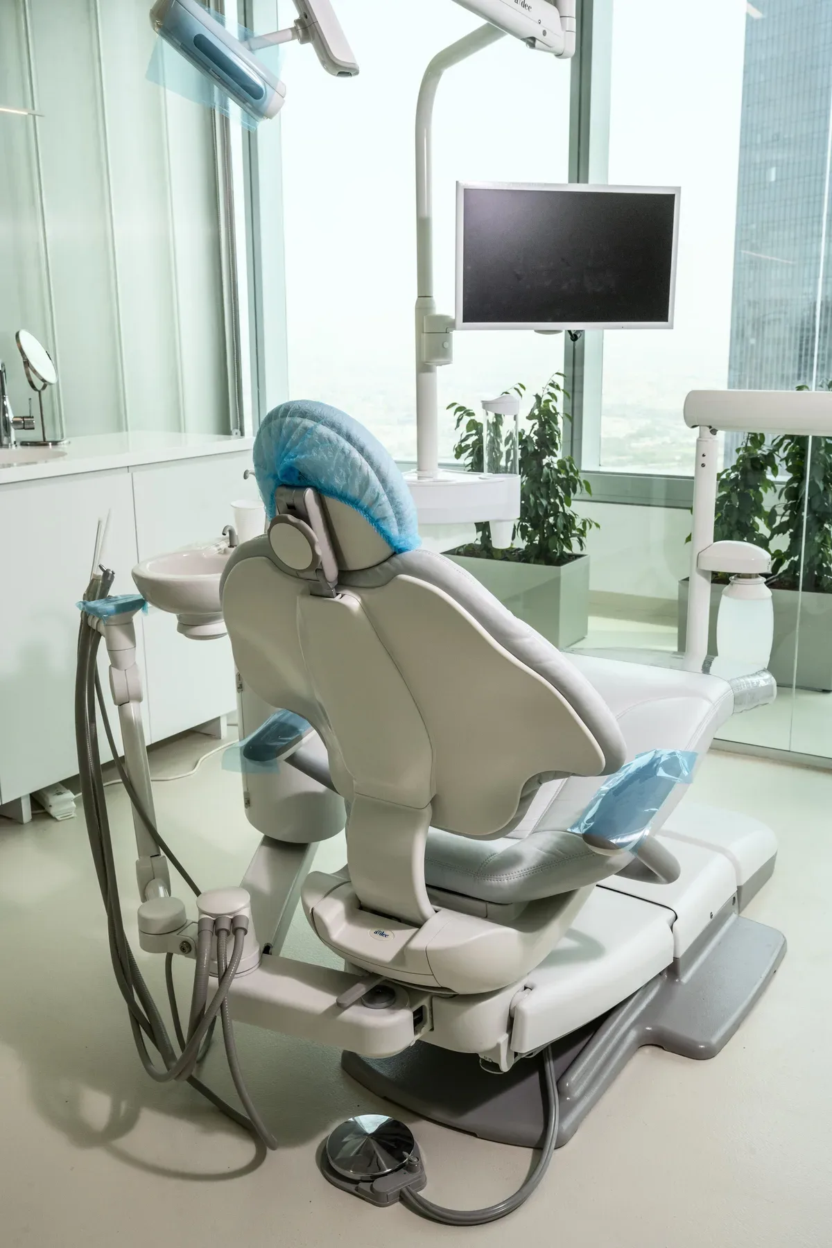 A dental chair by the window, from the tenant sessions.