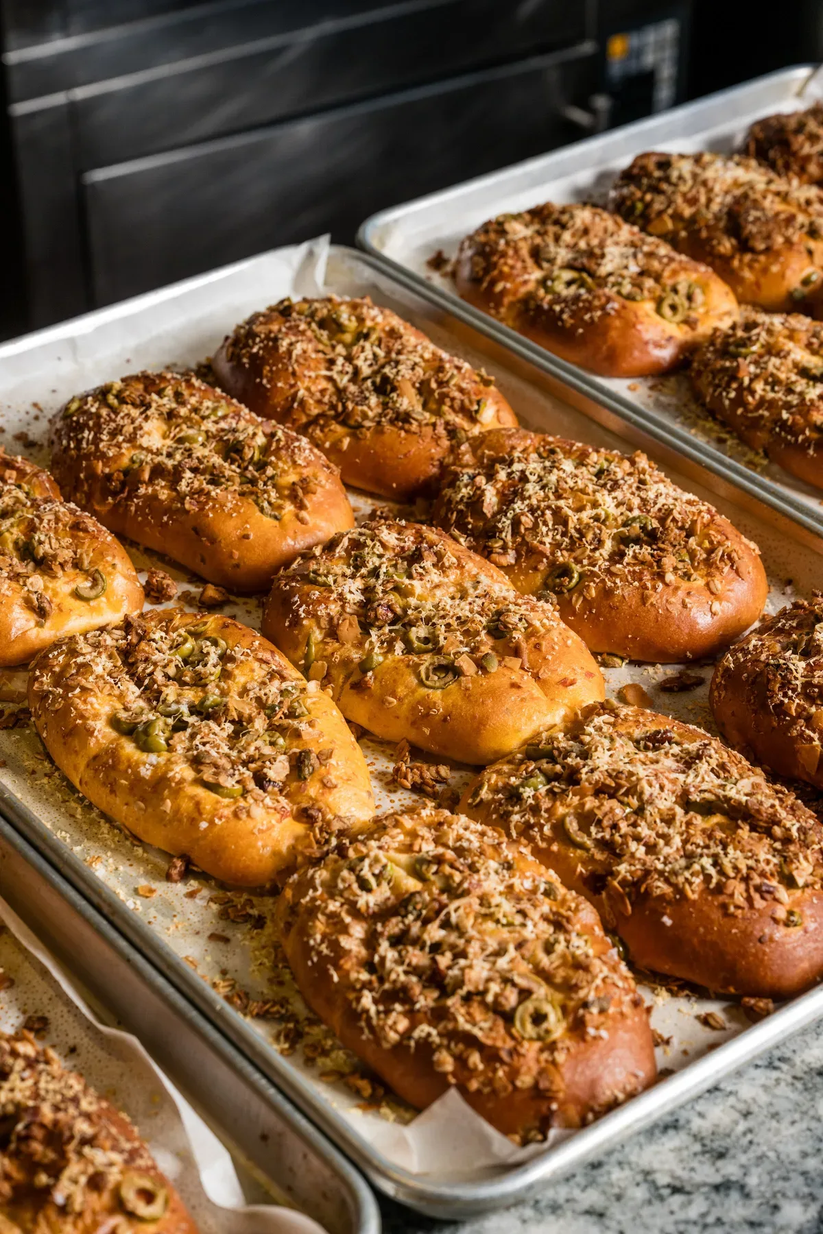 A tray of seeded buns out of the oven.
