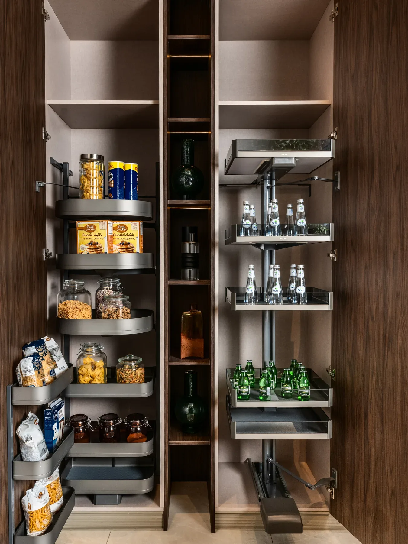 A pull out pantry carousel, stocked and photographed open.