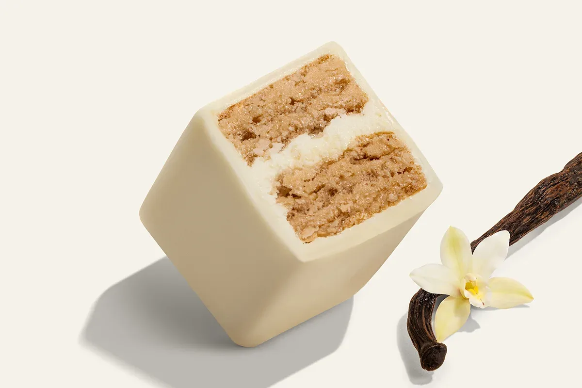 Perfectly Vanilla wafer cut open on its flavour colour.